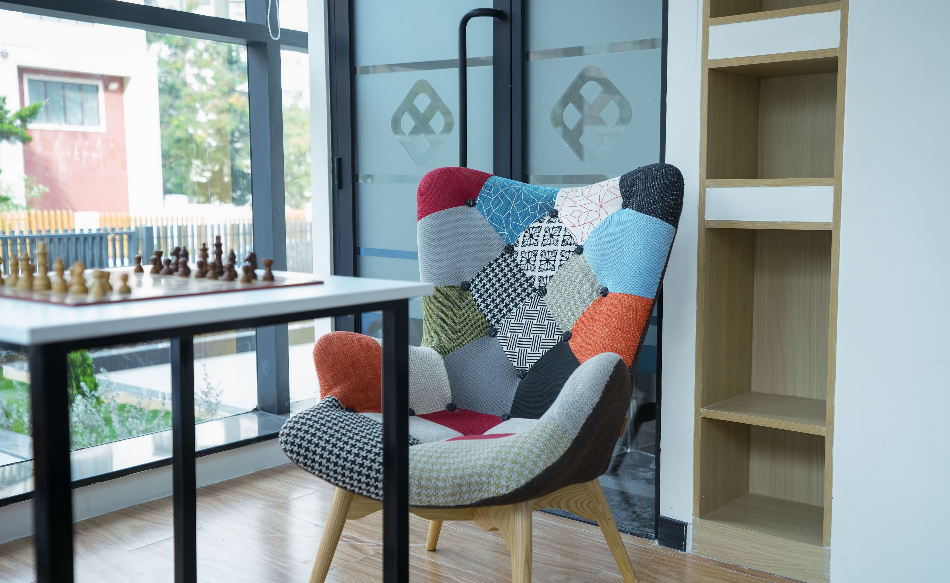 Modern office amenities including ergonomic chairs and large monitors